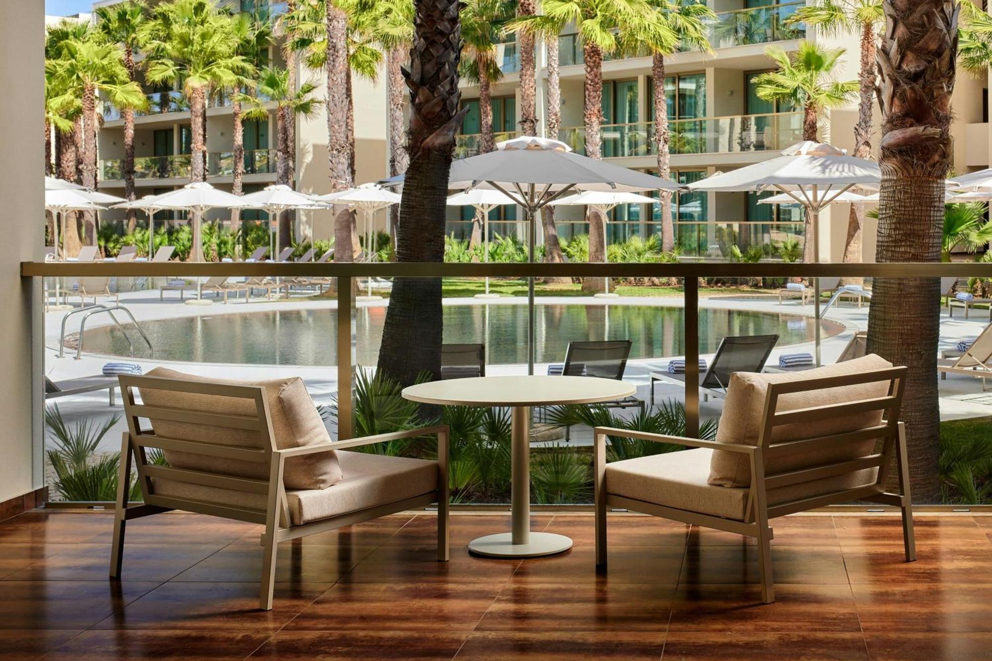 Two-Bedroom Suite Balcony Pool View