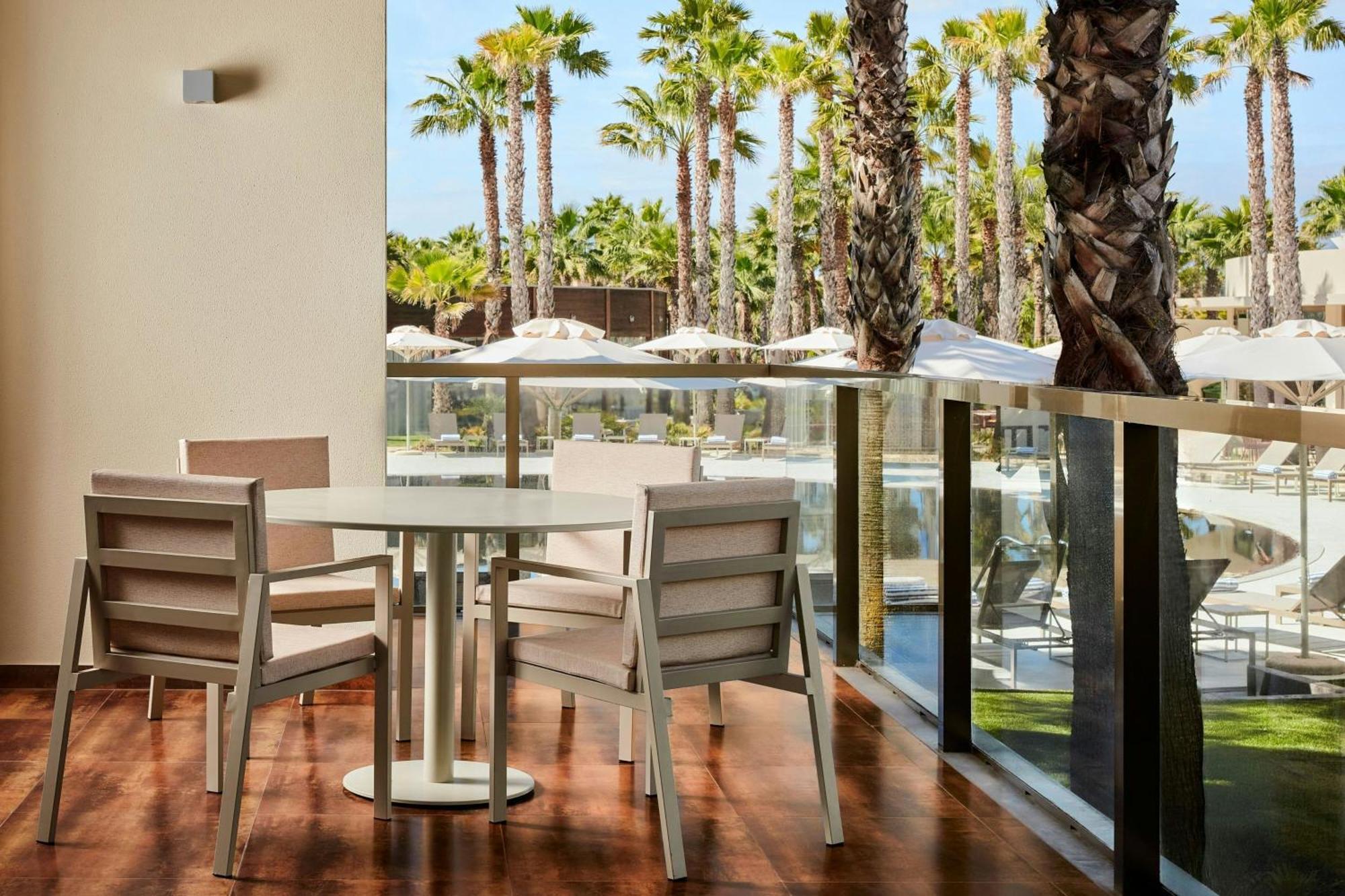 Three-Bedroom Suite Balcony Pool View